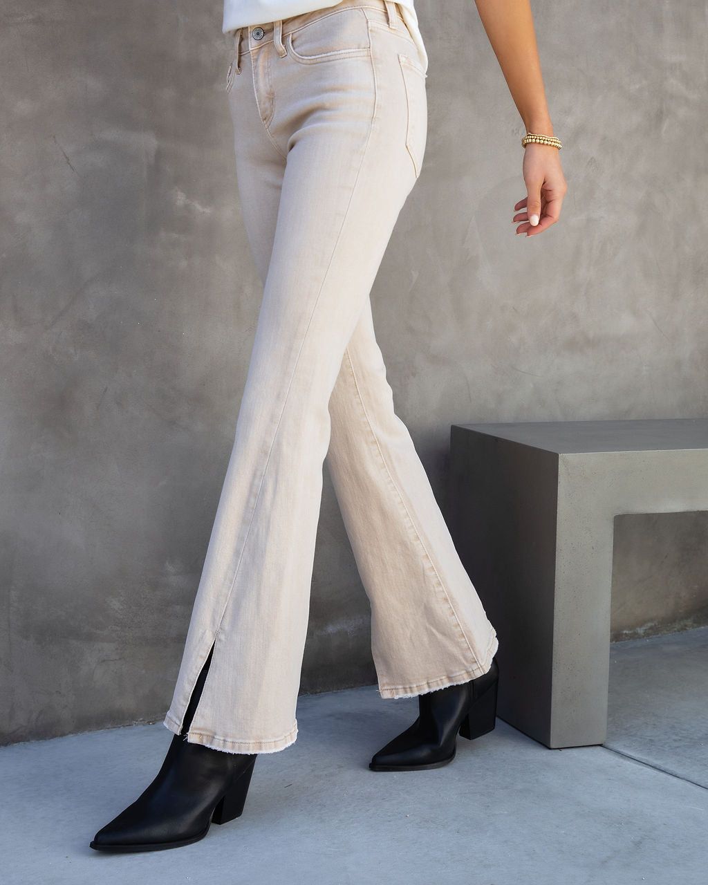 Alison Mid Rise Split Hem Flare Jeans sold by Vici