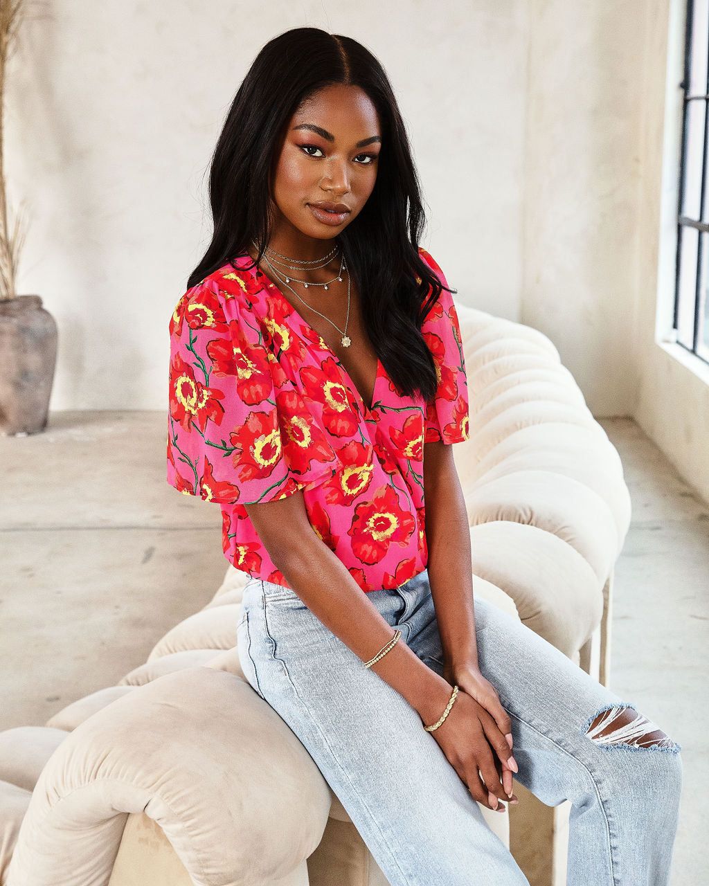 Kaliana Floral Flutter Sleeve Bodysuit sold by Vici