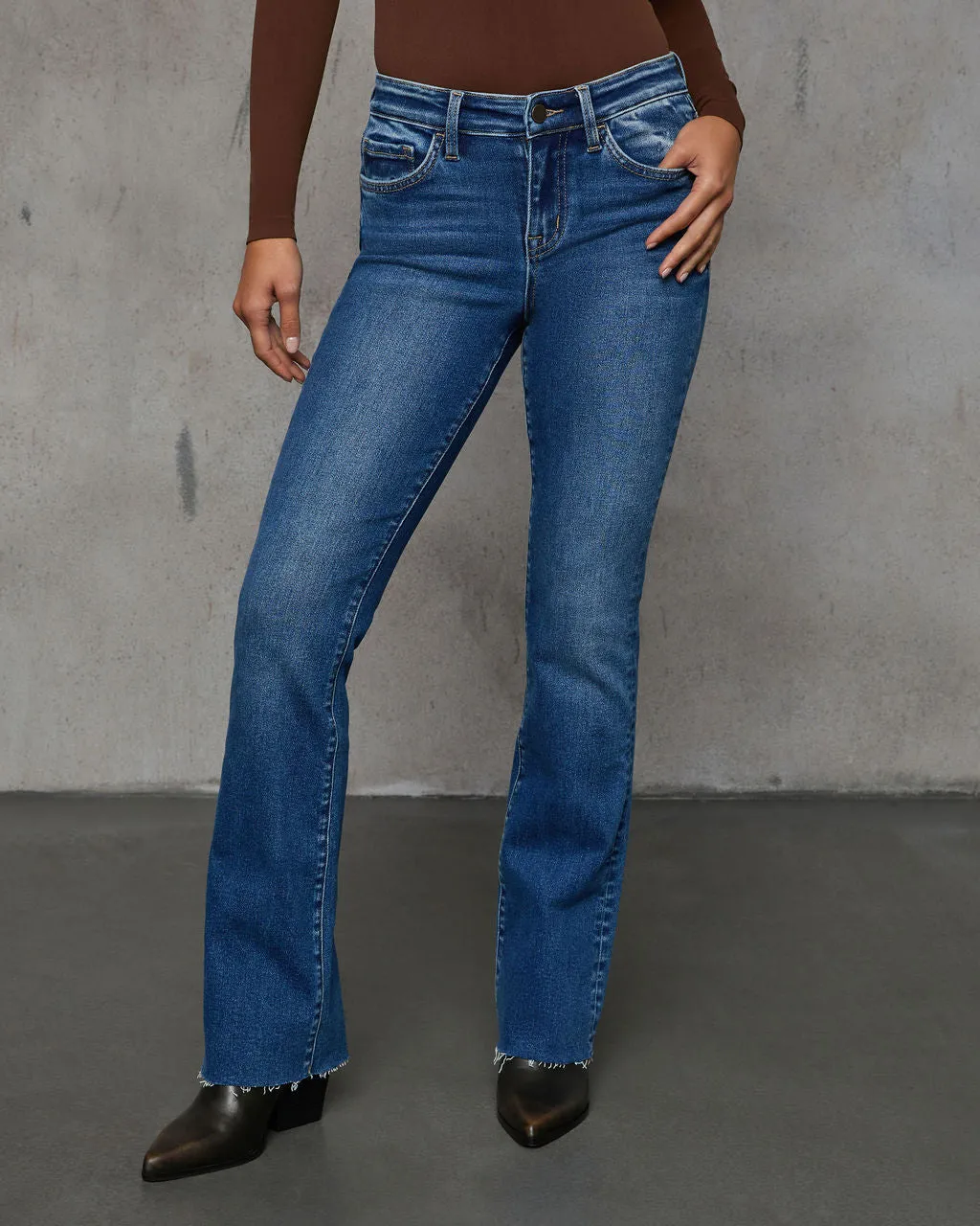 Nicolete Mid Rise Bootcut Jeans sold by Vici