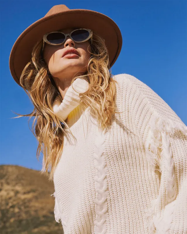 Alyson Turtleneck Fringe Trim Sweater sold by Vici