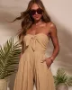 Free Spirited Strapless Tie Front Jumpsuit sold by Vici
