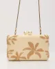 Voyage On Woven Straw Clutch sold by Vici