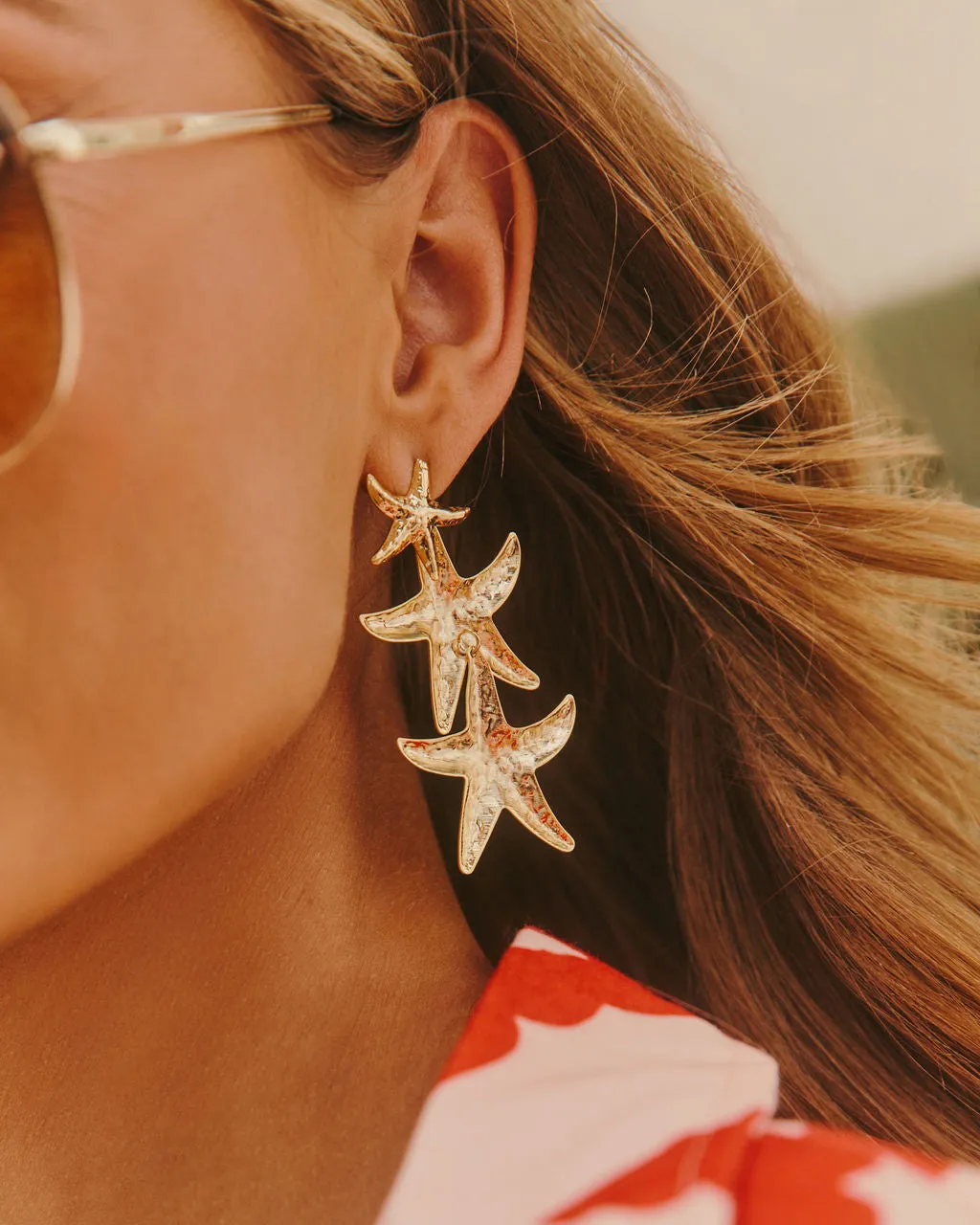 Sandbar Tiered Starfish Earrings sold by Vici