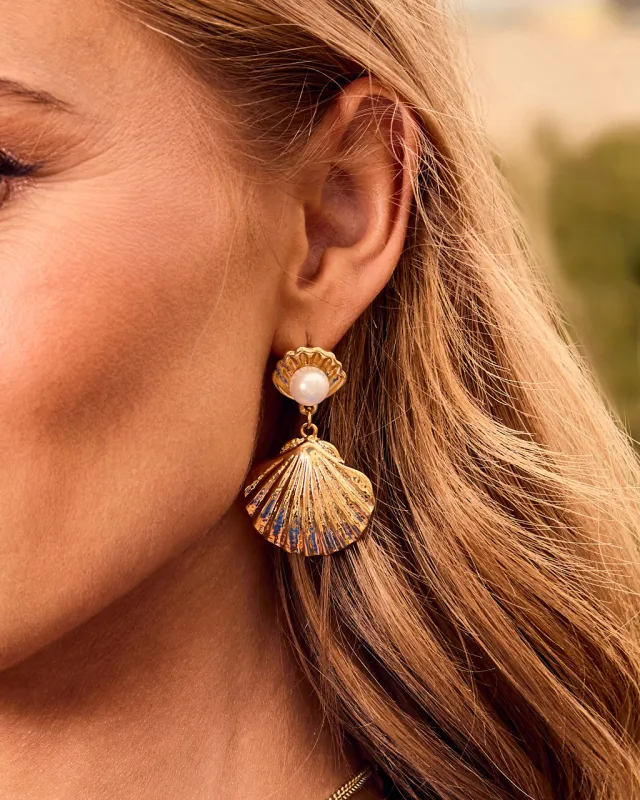 Shoreline Glow Seashell Drop Earrings sold by Vici
