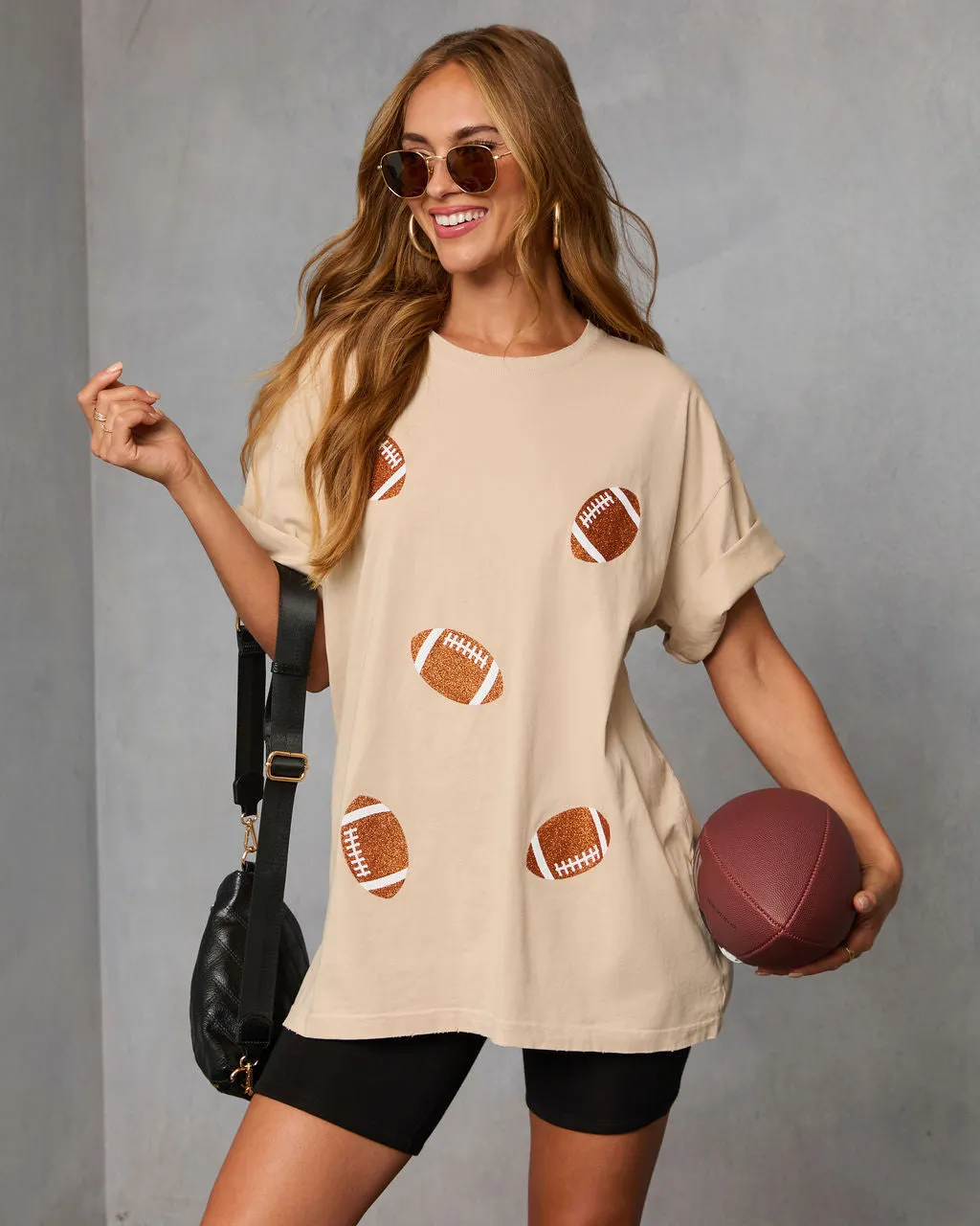Stadium Shine Oversized Football Graphic Tee sold by Vici
