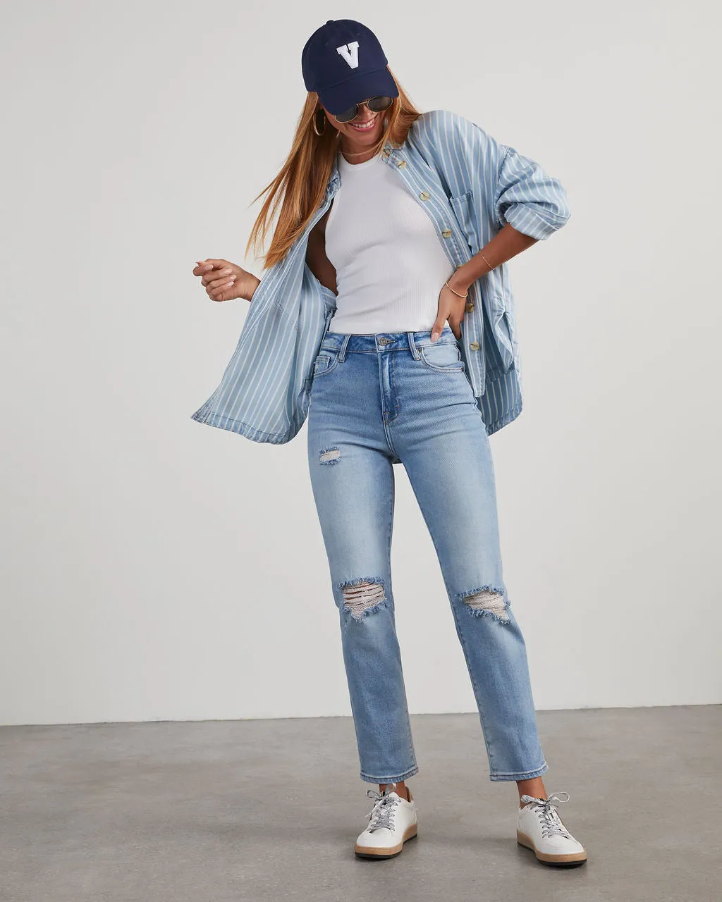 Polly Mid Rise Distressed Straight Leg Jeans sold by Vici