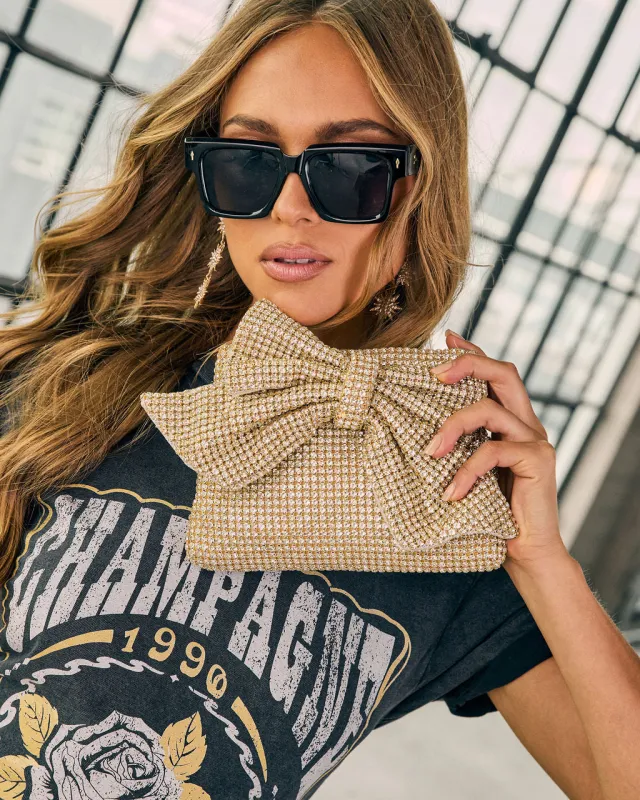 Timeless Shine Embellished Bow Clutch sold by Vici