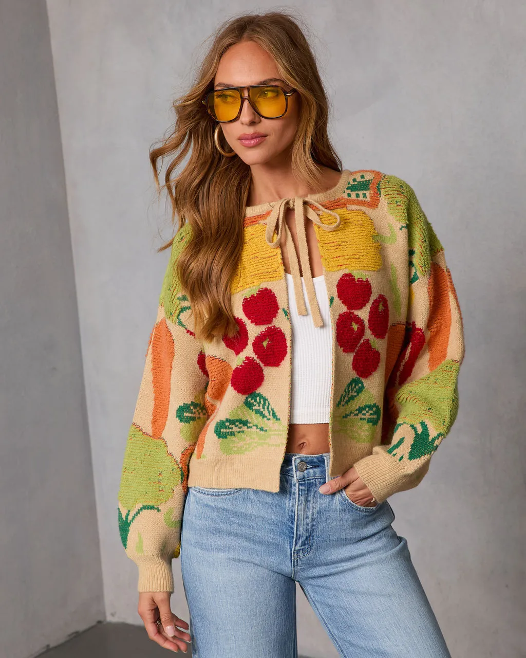 Fresh Picks Graphic Front Tie Sweater sold by Vici