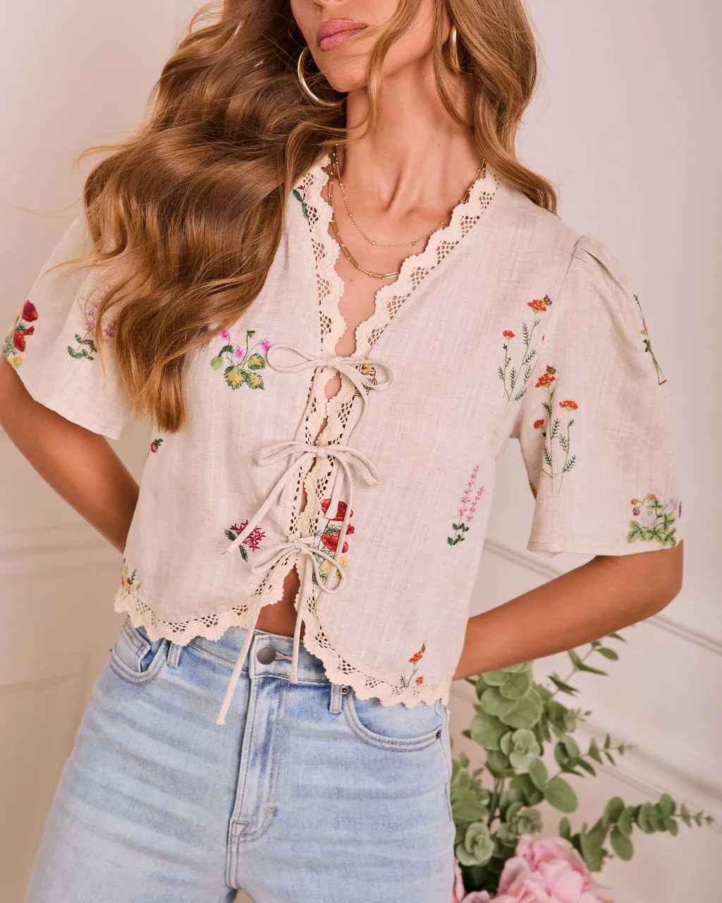 Bloom Break Embroidered Floral Tie Front Top sold by Vici