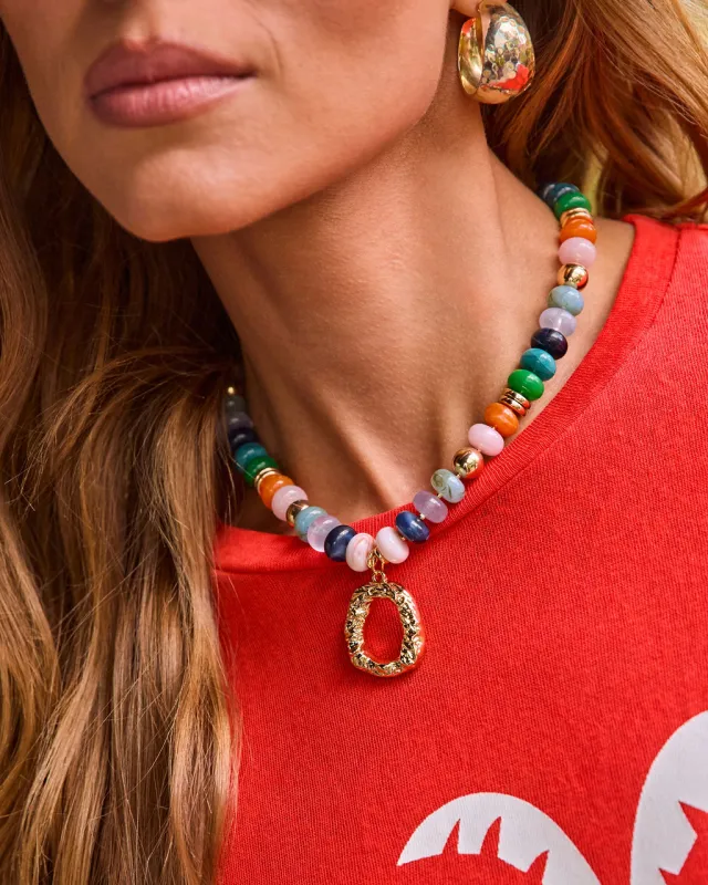 Golden Sol Beaded Charm Necklace sold by Vici