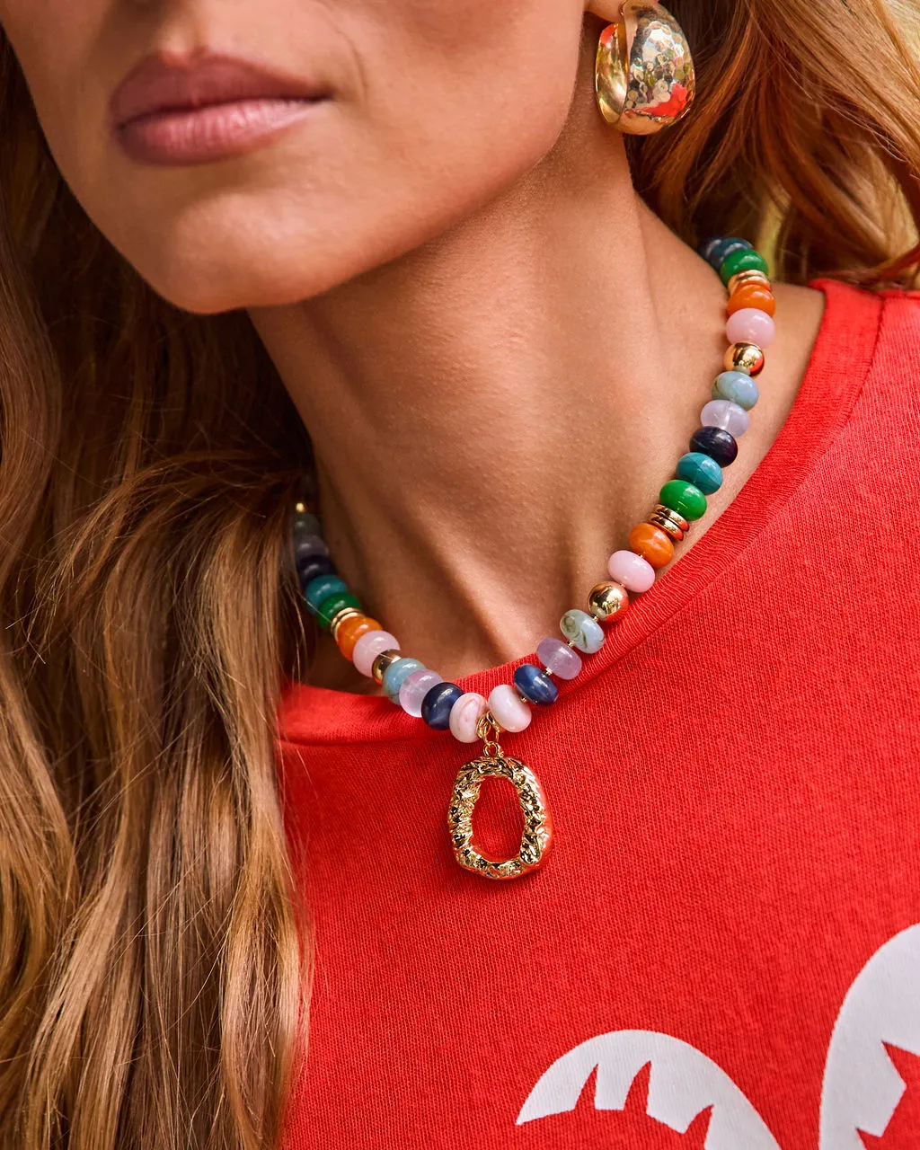 Golden Sol Beaded Charm Necklace sold by Vici