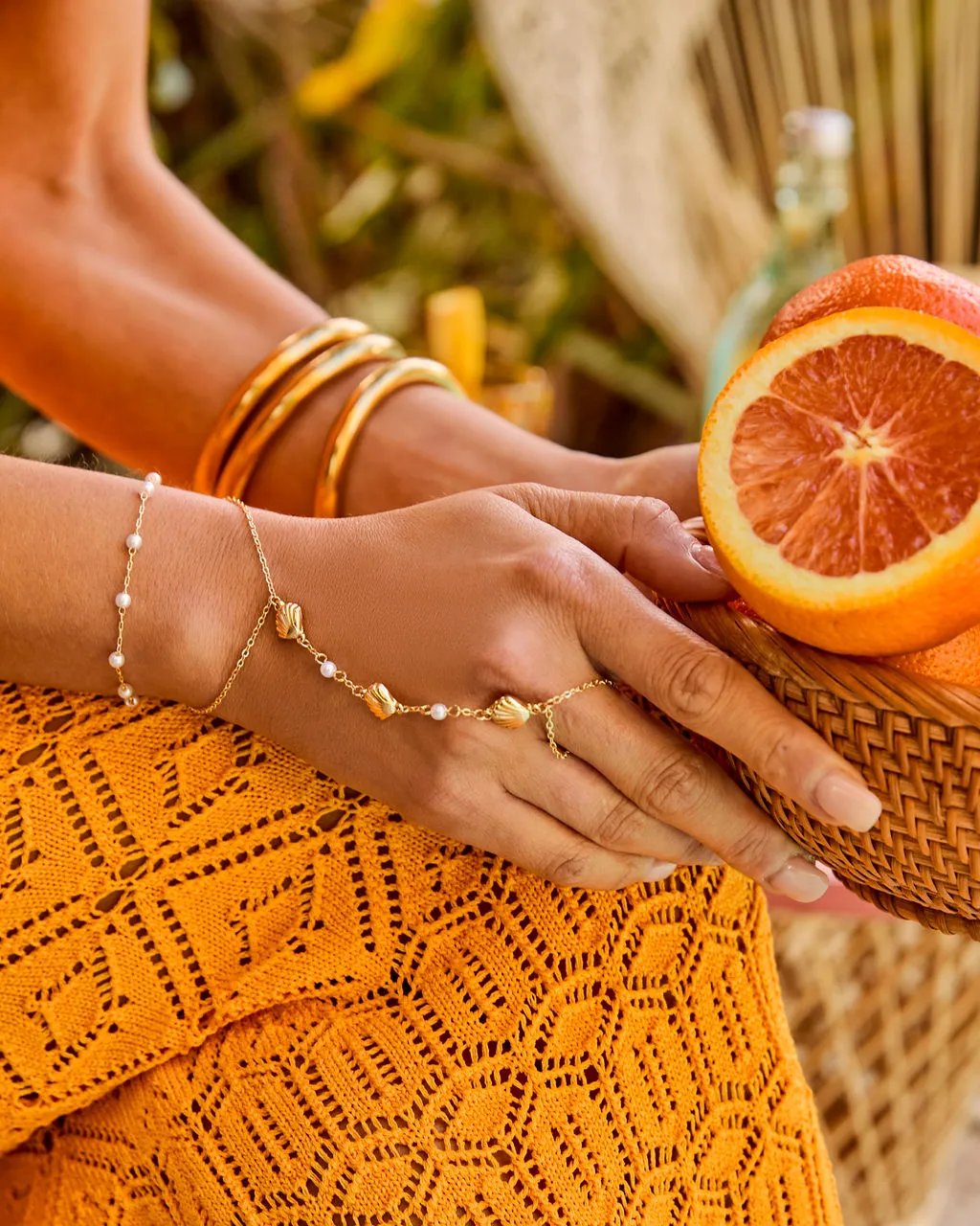 Golden Ease Seashell Charm Hand Chain sold by Vici