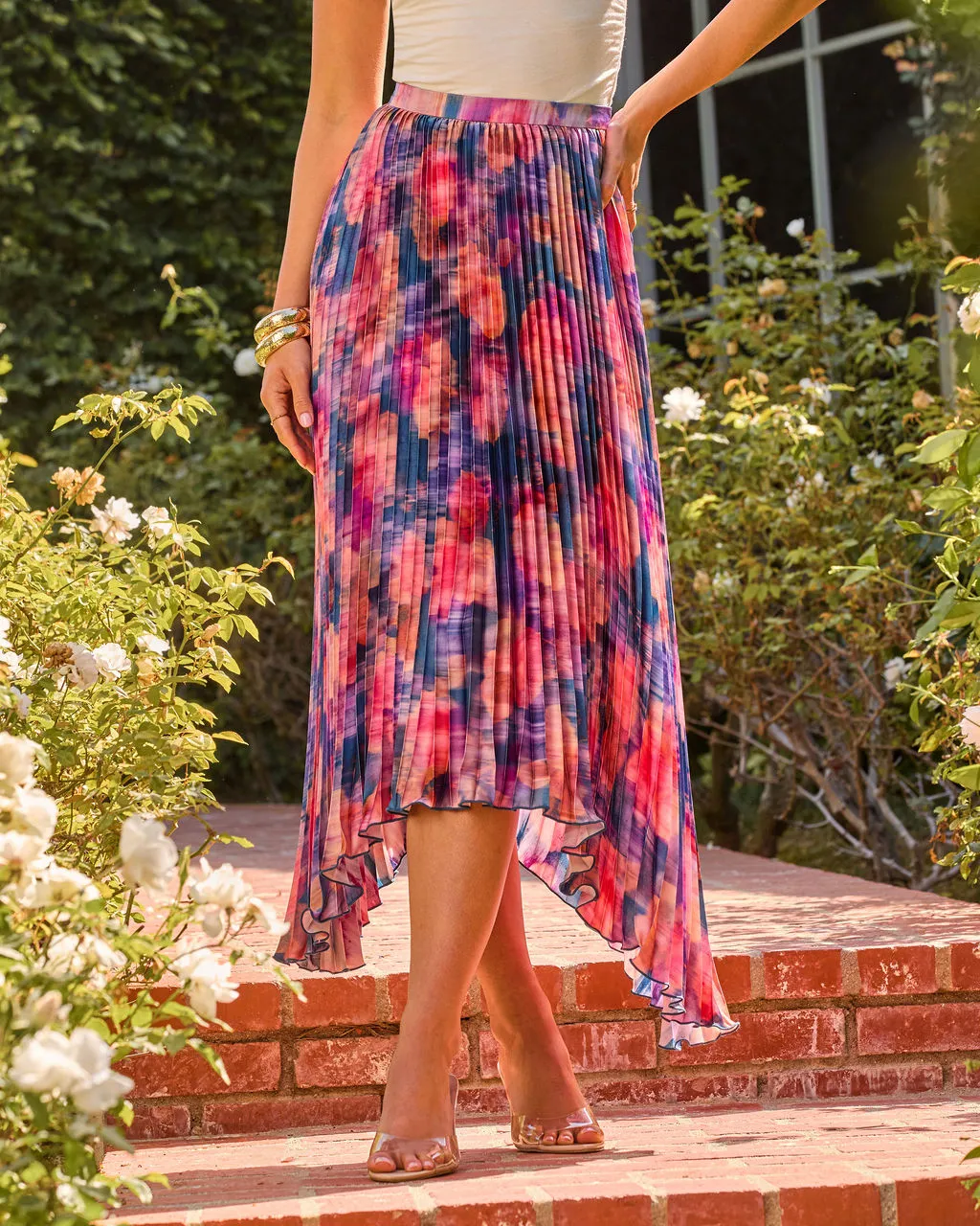 Petal Haven Pleated Floral Midi Skirt sold by Vici
