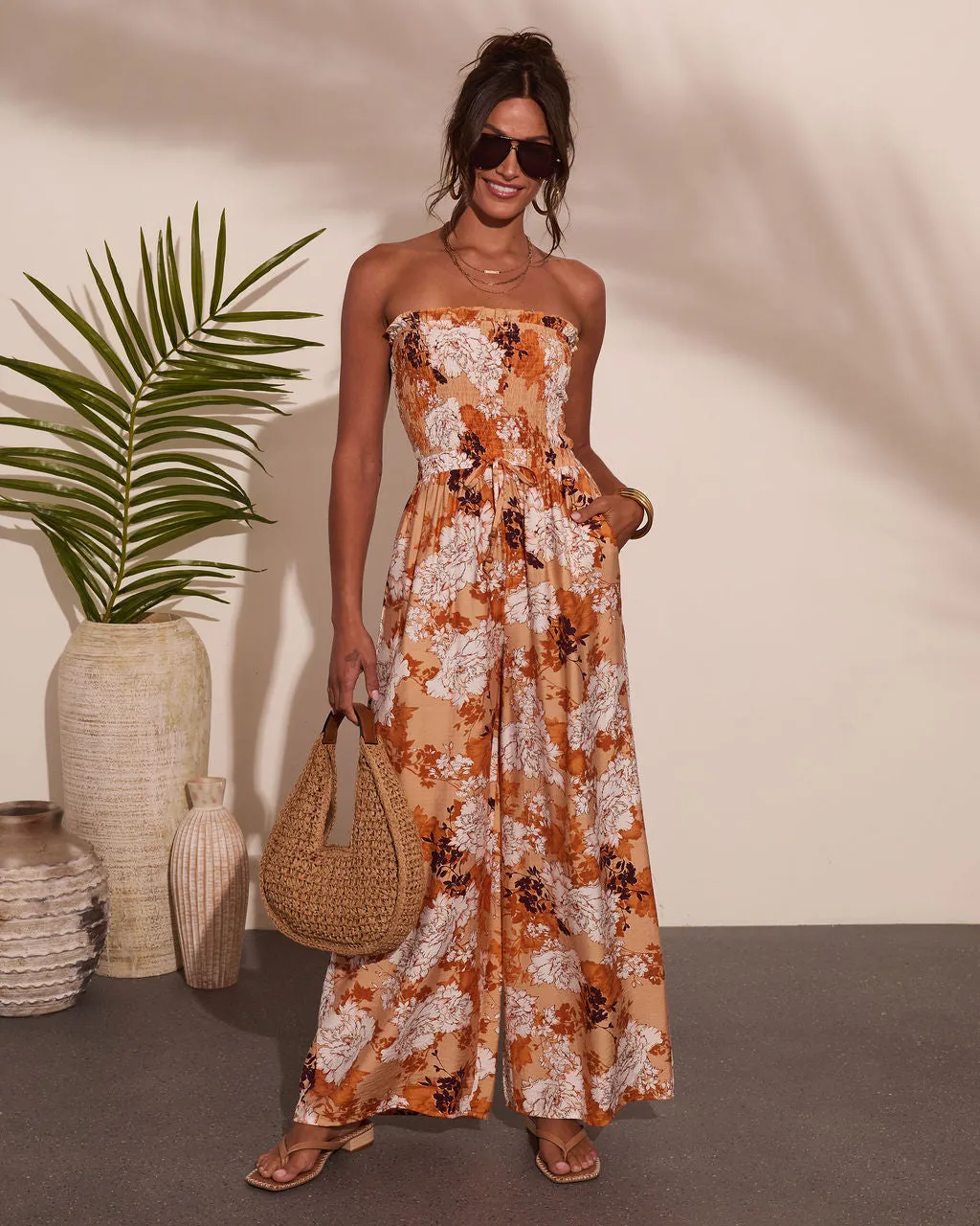 Sun Daydream Strapless Floral Print Jumpsuit sold by Vici