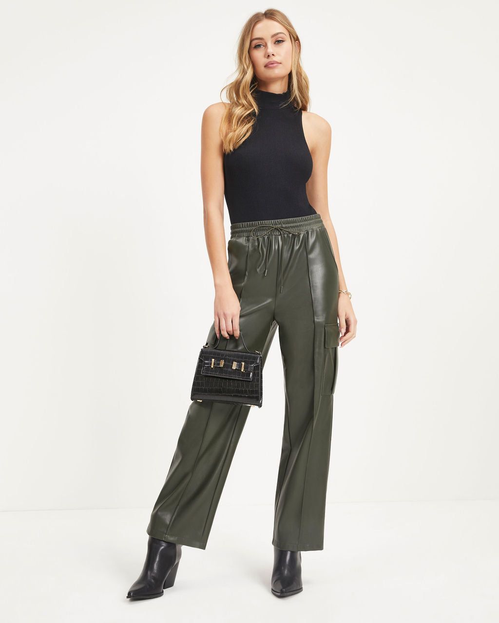 Explore The World Faux Leather Cargo Pants sold by Vici