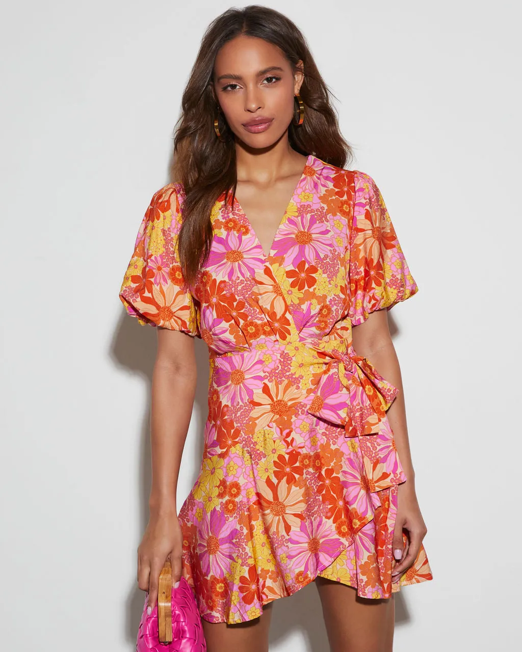 Sienna Floral Wrap Mini Dress sold by Vici