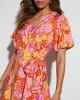 Sienna Floral Wrap Mini Dress sold by Vici
