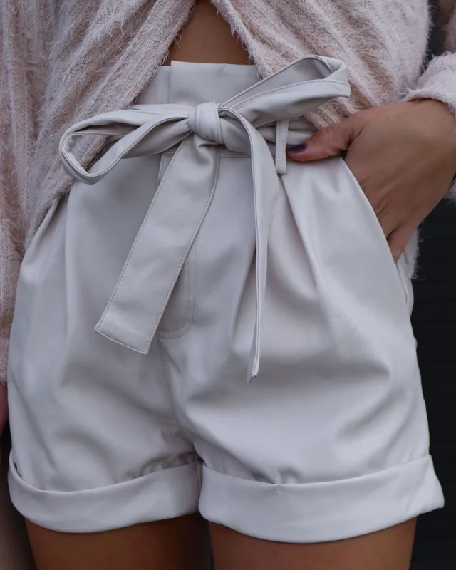 Slay With Sweetness Faux Leather Waist Tie Pocketed Shorts sold by Vici