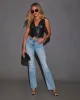 Kerra Mid Rise Distressed Bootcut Jeans sold by Vici