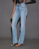 Kerra Mid Rise Distressed Bootcut Jeans sold by Vici