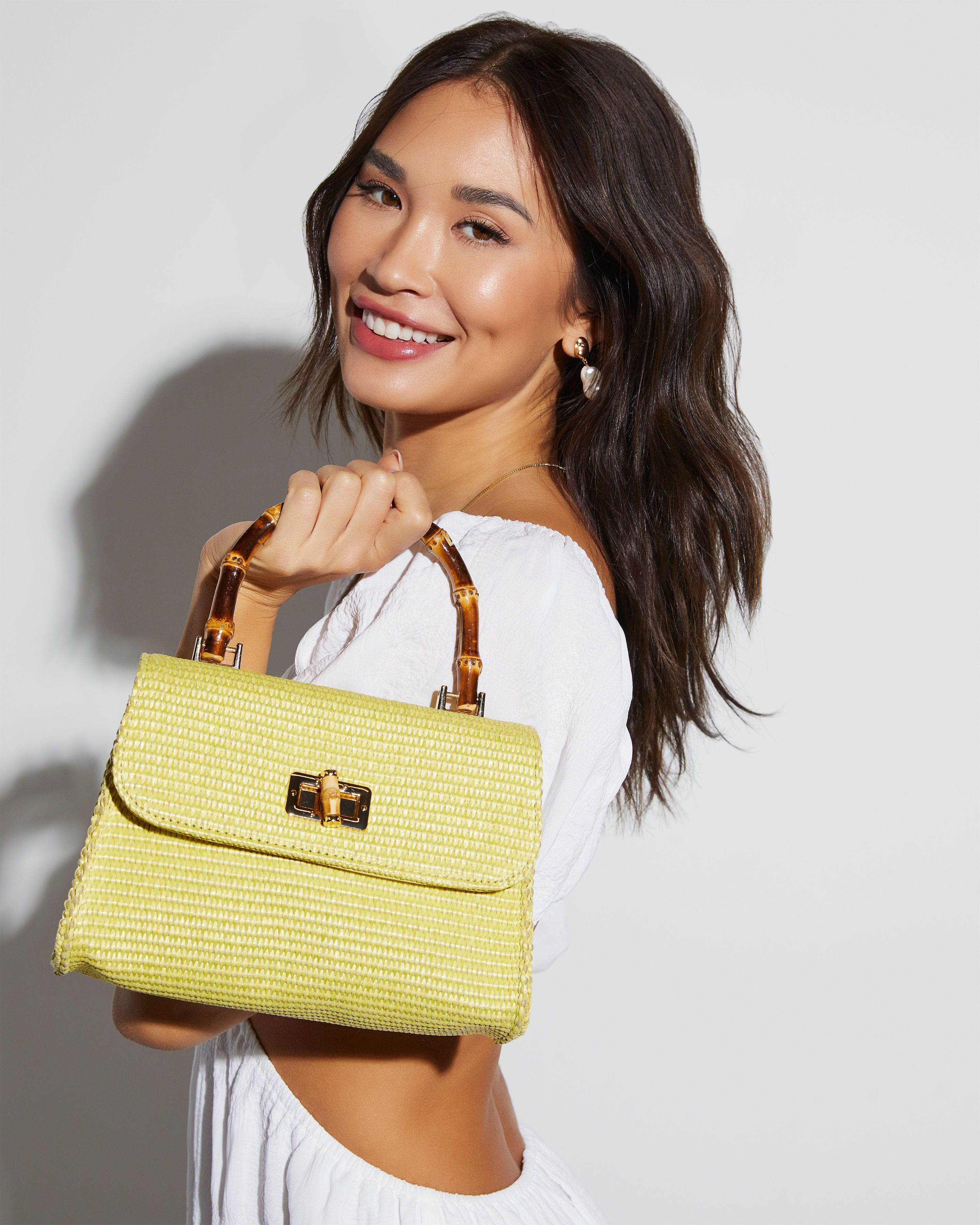 Skyler Raffia Top Handle Bag sold by Vici