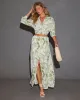 Kai Front Slit Drawstring Printed Maxi Skirt sold by Vici