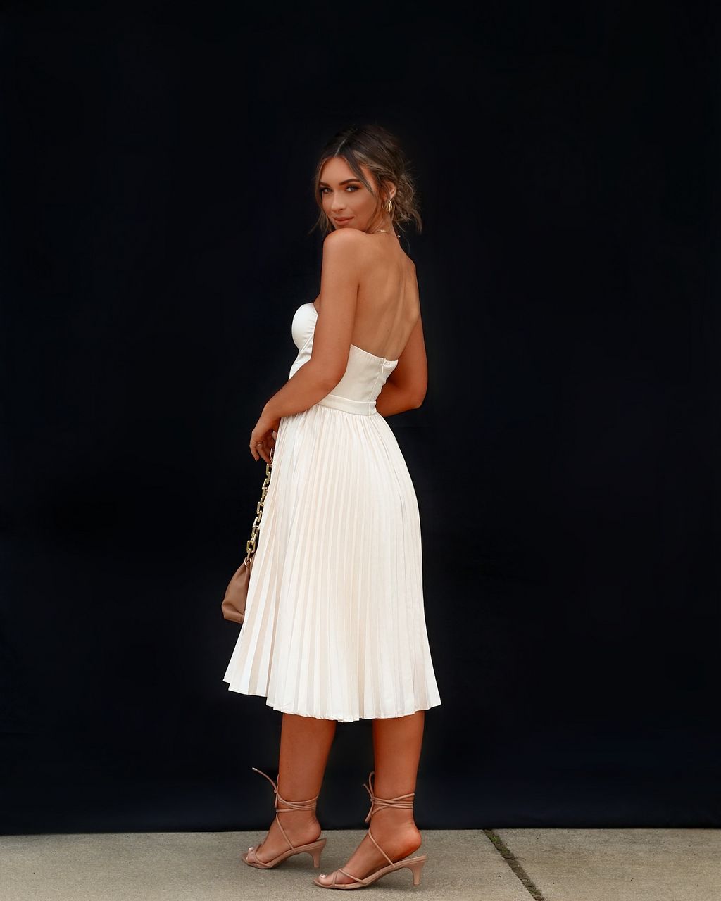 Main Character Satin Pleated Strapless Midi Dress sold by Vici