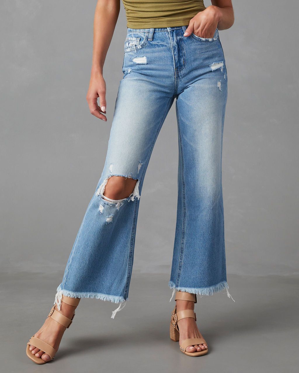 Daniela Distressed High Rise Flare Jeans sold by Vici