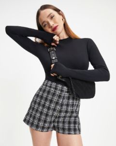 Impeccable Class Tweed Shorts sold by Vici