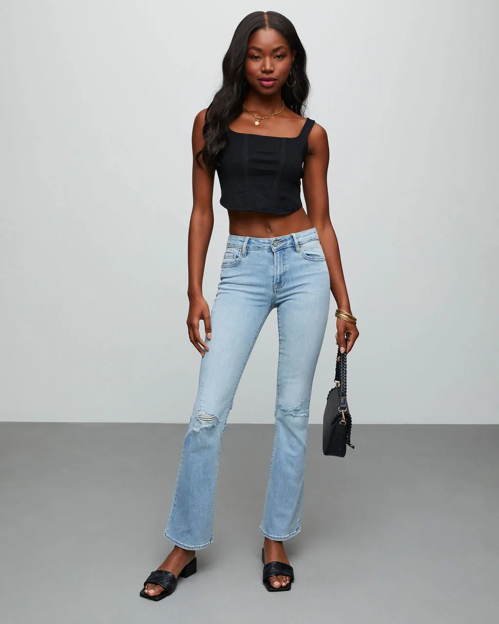 Matira High Rise Distressed Flare Jeans sold by Vici