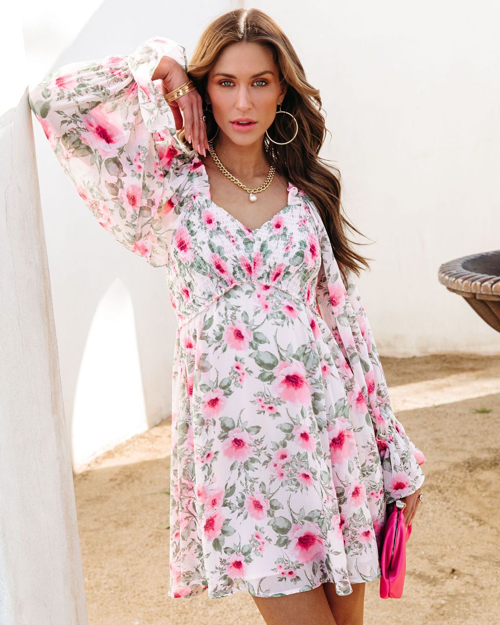 Shower Me In Florals Smocked Mini Dress sold by Vici