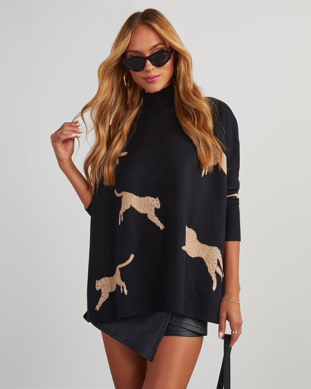 Wildcat Cheetah Mock Neck Sweater sold by Vici