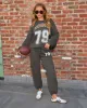 Touchdown Graphic Joggers sold by Vici