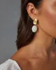 Gold And Pearl Drop Earrings sold by Vici