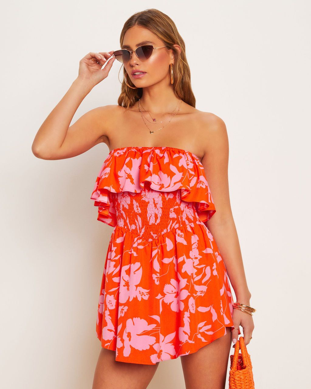 Janette Floral Strapless Smocked Romper sold by Vici