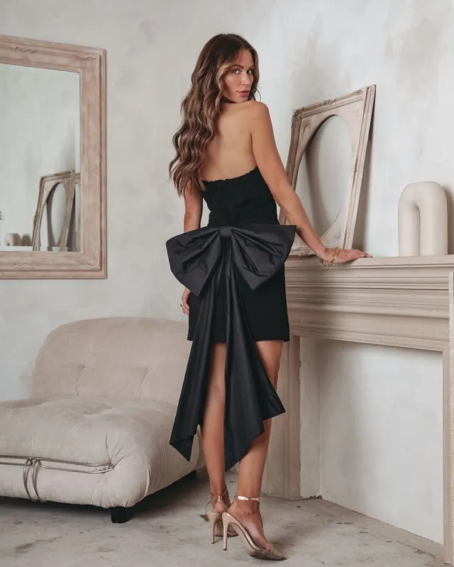 Attention Getter Strapless Bow Detailed Mini Dress sold by Vici