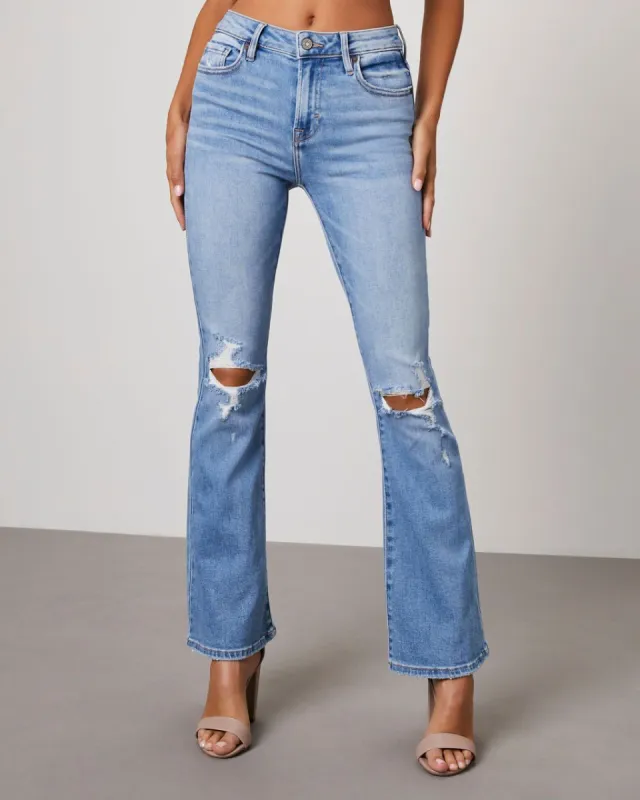 Malika High Rise Distressed Flare Jeans sold by Vici