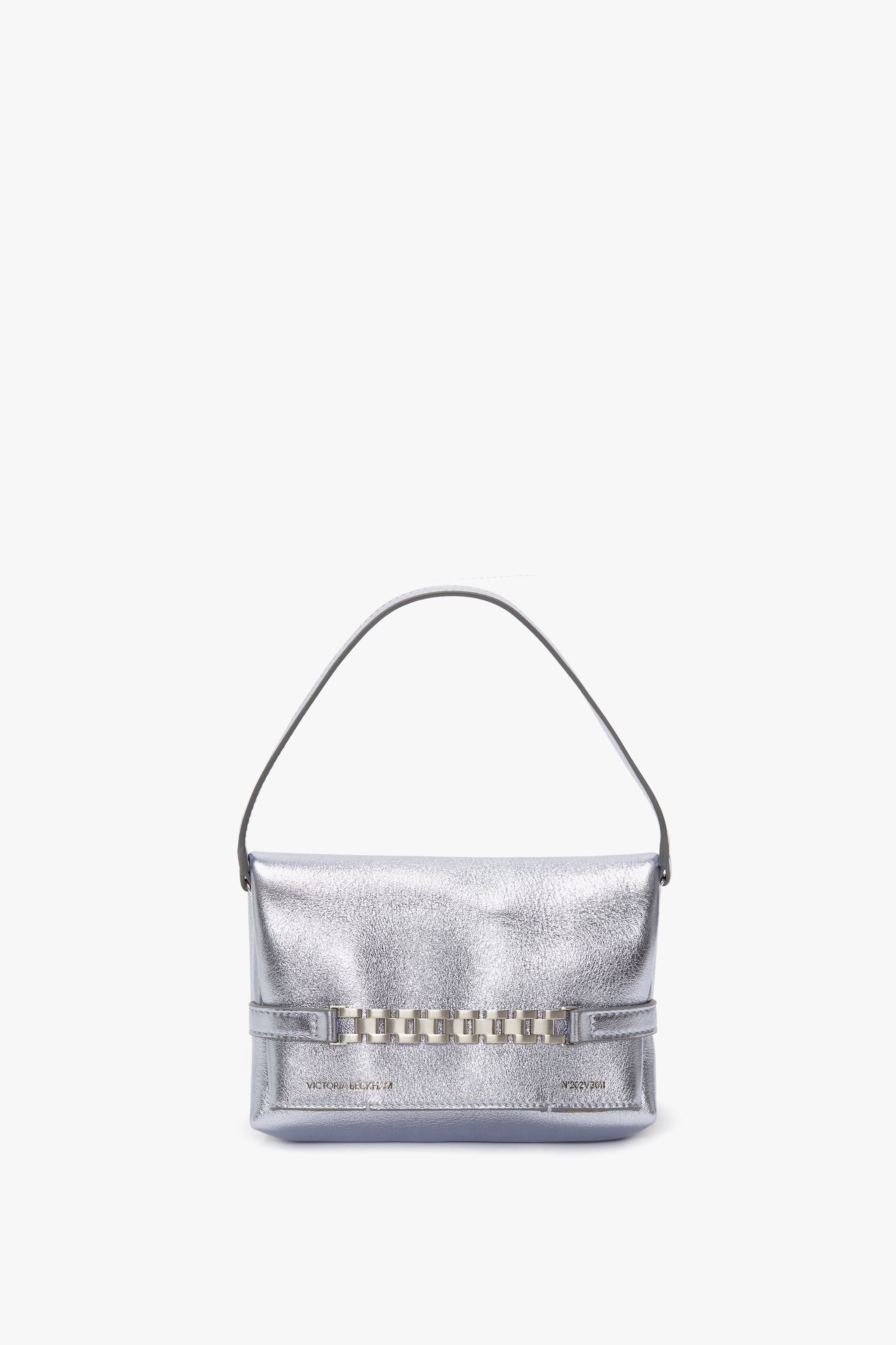 Mini Chain Pouch In Metallic Sky Leather sold by Victoria Beckham