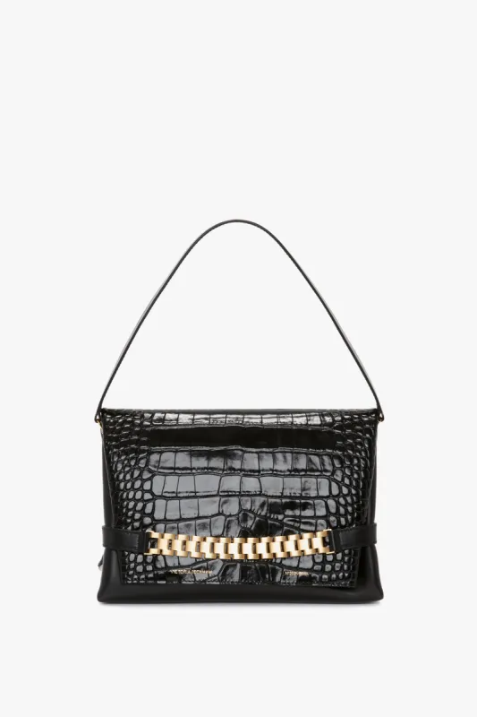 Chain Pouch Bag With Strap In Black Croc Embossed Leather sold by Victoria Beckham