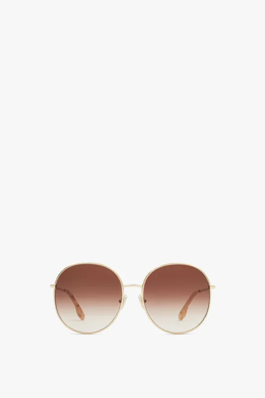 Hammered Round Sunglasses In Gold Brown made by Victoria Beckham