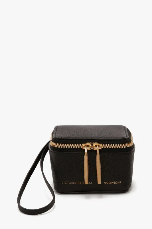 Micro Vanity Wristlet In Black Leather sold by Victoria Beckham