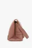 Chain Pouch Bag With Strap In Truffle Leather sold by Victoria Beckham