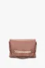 Chain Pouch Bag With Strap In Truffle Leather sold by Victoria Beckham