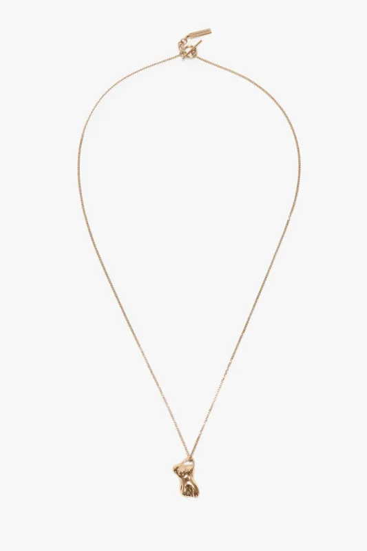 Body Charm Necklace In Light Gold sold by Victoria Beckham