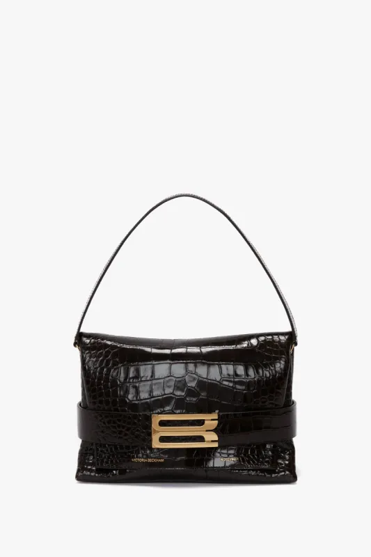 B Pouch Bag In Croc Embossed Espresso Leather sold by Victoria Beckham