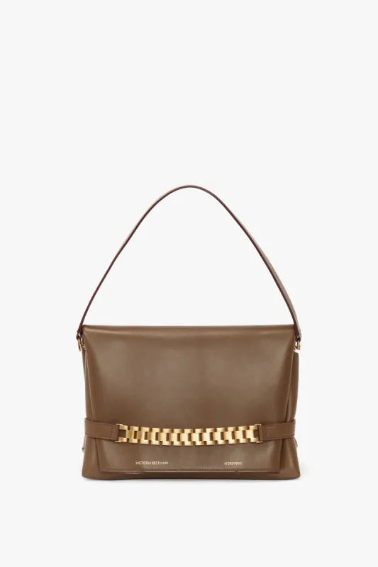 Chain Pouch Bag With Strap In Khaki Leather sold by Victoria Beckham