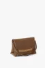 Chain Pouch Bag With Strap In Khaki Leather sold by Victoria Beckham