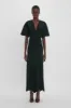 Gathered V-Neck Midi Dress in Black sold by Victoria Beckham