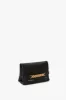 Mini Chain Pouch Bag With Long Strap In Black Leather sold by Victoria Beckham