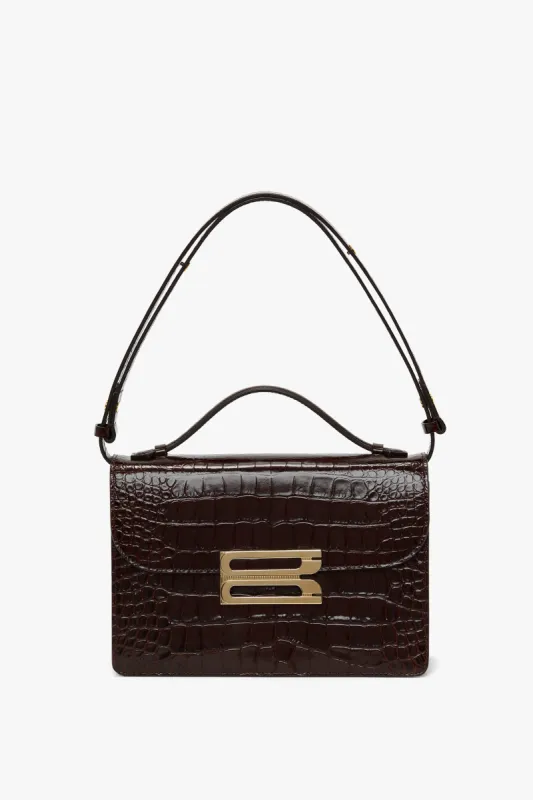 Dorian Bag In Dark Brown Croc Embossed Leather sold by Victoria Beckham